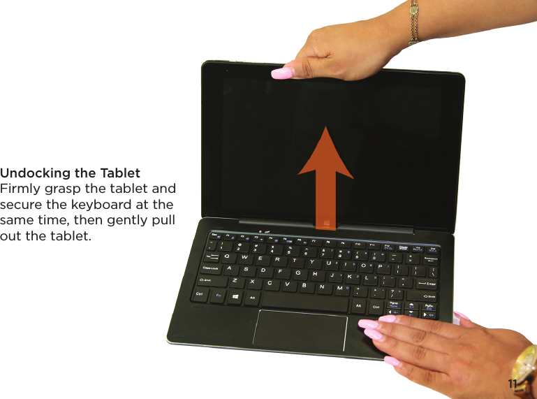 Undocking the TabletFirmly grasp the tablet and secure the keyboard at the same time, then gently pull out the tablet.11