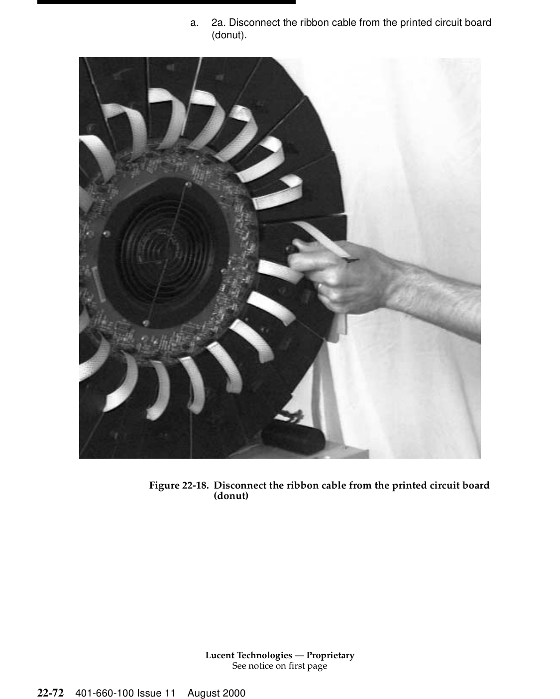 Lucent Technologies — ProprietarySee notice on first page22-72 401-660-100 Issue 11 August 2000a. 2a. Disconnect the ribbon cable from the printed circuit board (donut). Figure 22-18. Disconnect the ribbon cable from the printed circuit board (donut)