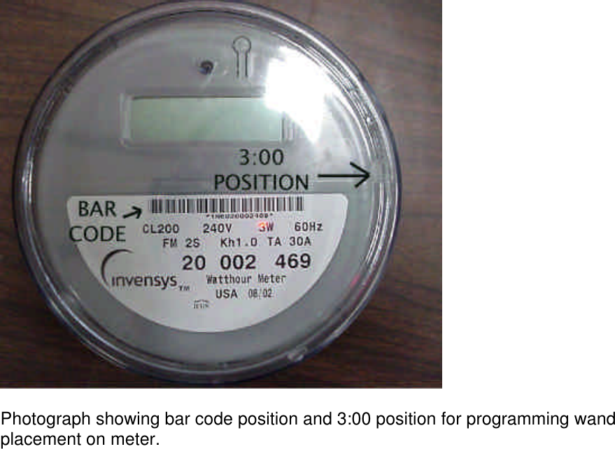   Photograph showing bar code position and 3:00 position for programming wand placement on meter.     
