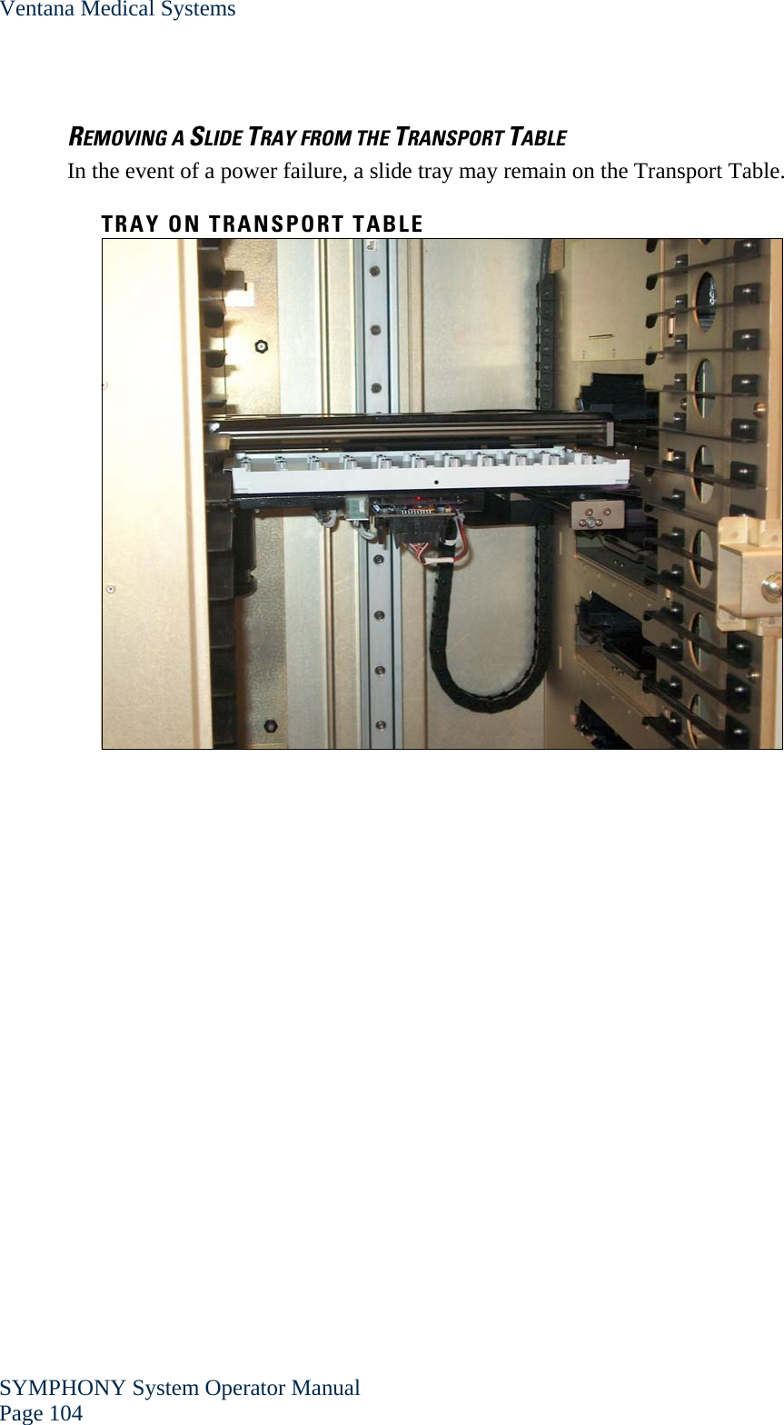 Ventana Medical Systems SYMPHONY System Operator Manual Page 104    REMOVING A SLIDE TRAY FROM THE TRANSPORT TABLE In the event of a power failure, a slide tray may remain on the Transport Table.  TRAY ON TRANSPORT TABLE      