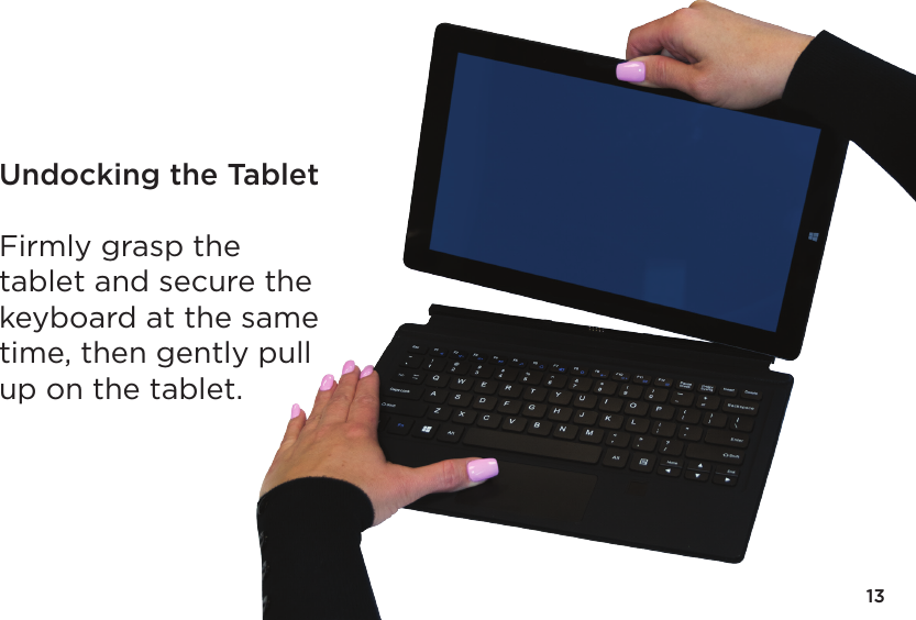 13Undocking the TabletFirmly grasp the tablet and secure the keyboard at the same time, then gently pull up on the tablet.